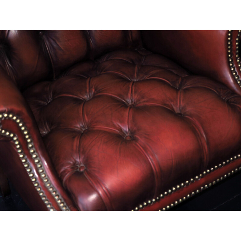 Fauteuil lounge vintage Chesterfield Wing en cuir touffeté 1970