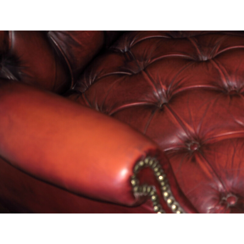 Fauteuil lounge vintage Chesterfield Wing en cuir touffeté 1970