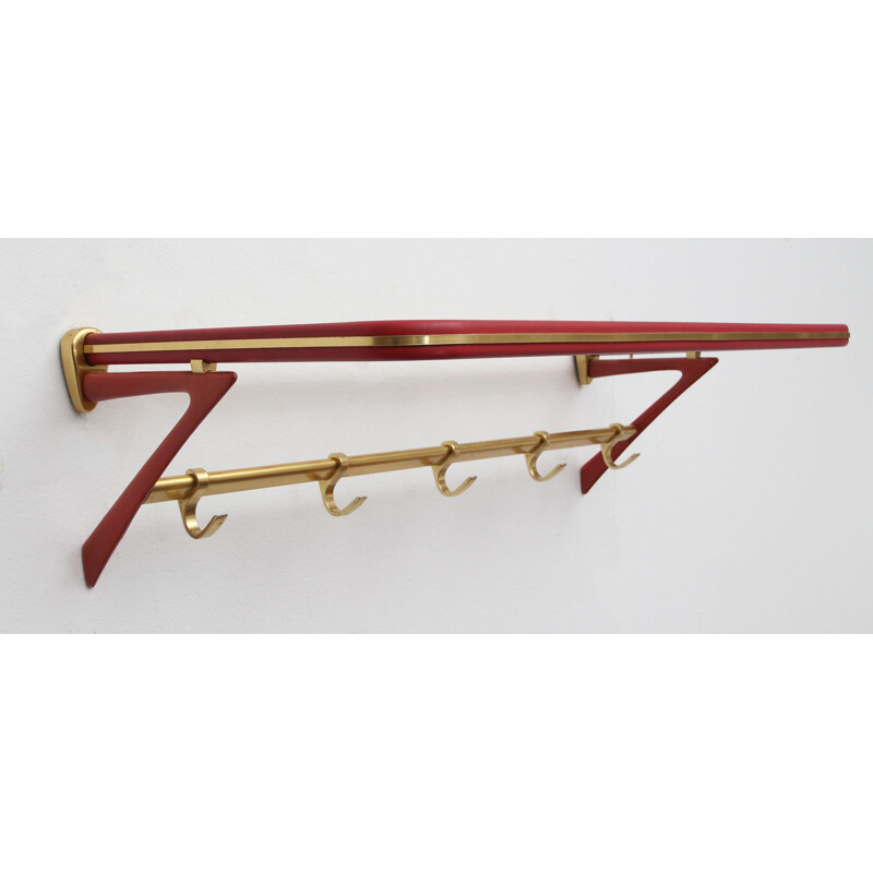 Vintage coatrack in red and brass 1950s