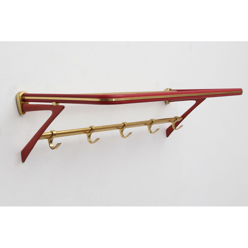 Vintage coatrack in red and brass 1950s