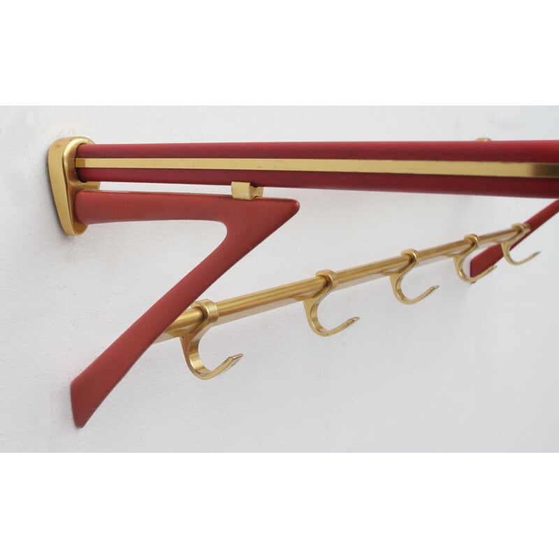 Vintage coatrack in red and brass 1950s