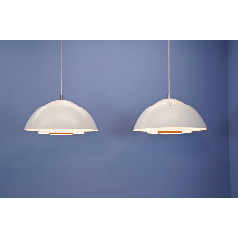 Pair of vintage pendants 'Safari' in white with orange accent by Christian Hvidt for Nordisk Solar danish 1970s