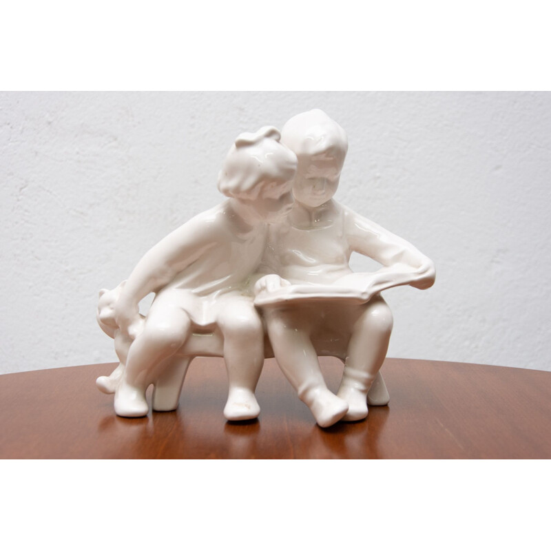 Vintage ceramic sculpture children with a book by Keramia Znojmo, Czechoslovakia 1950