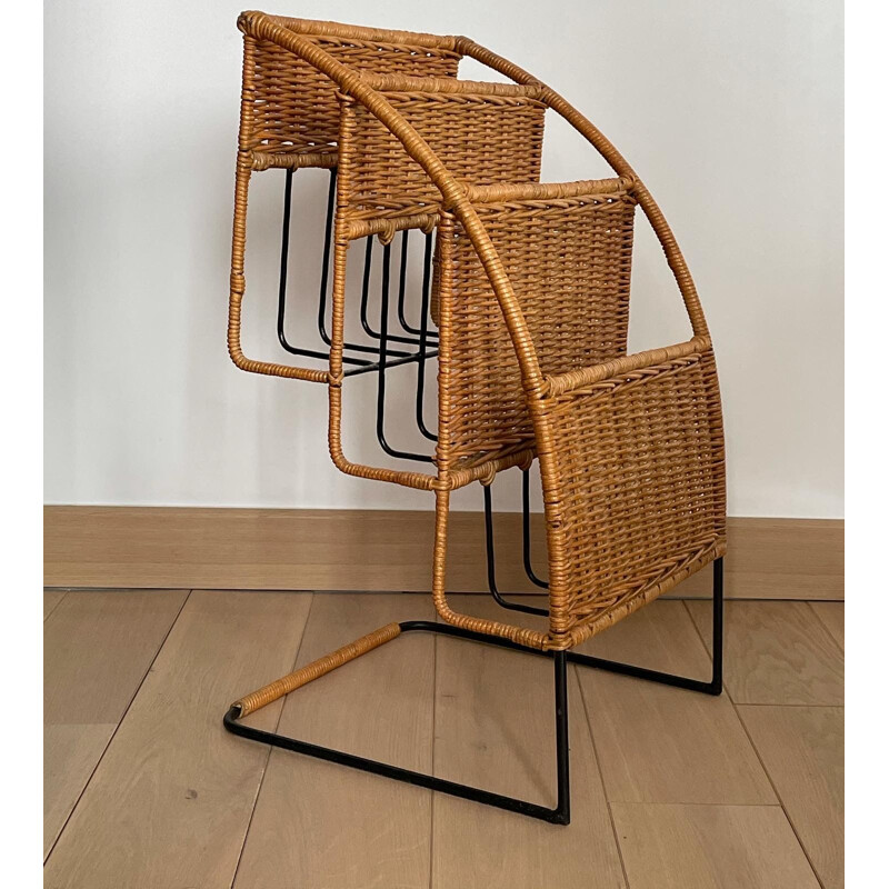 Vintage magazine rack in black lacquered metal and rattan by Raoul Guys, France 1950s