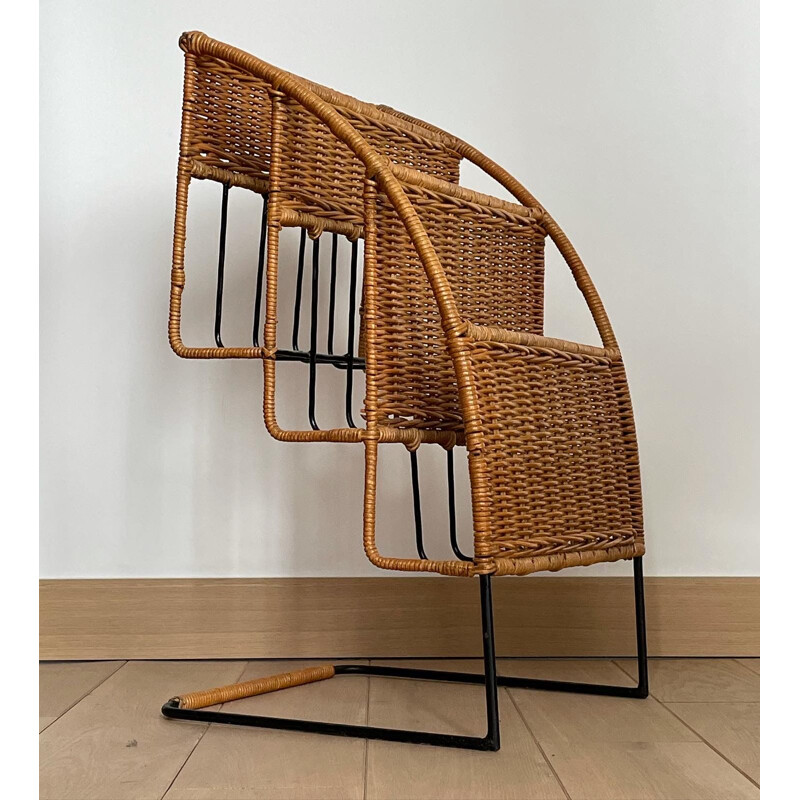 Vintage magazine rack in black lacquered metal and rattan by Raoul Guys, France 1950s