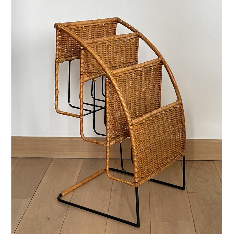 Vintage magazine rack in black lacquered metal and rattan by Raoul Guys, France 1950s