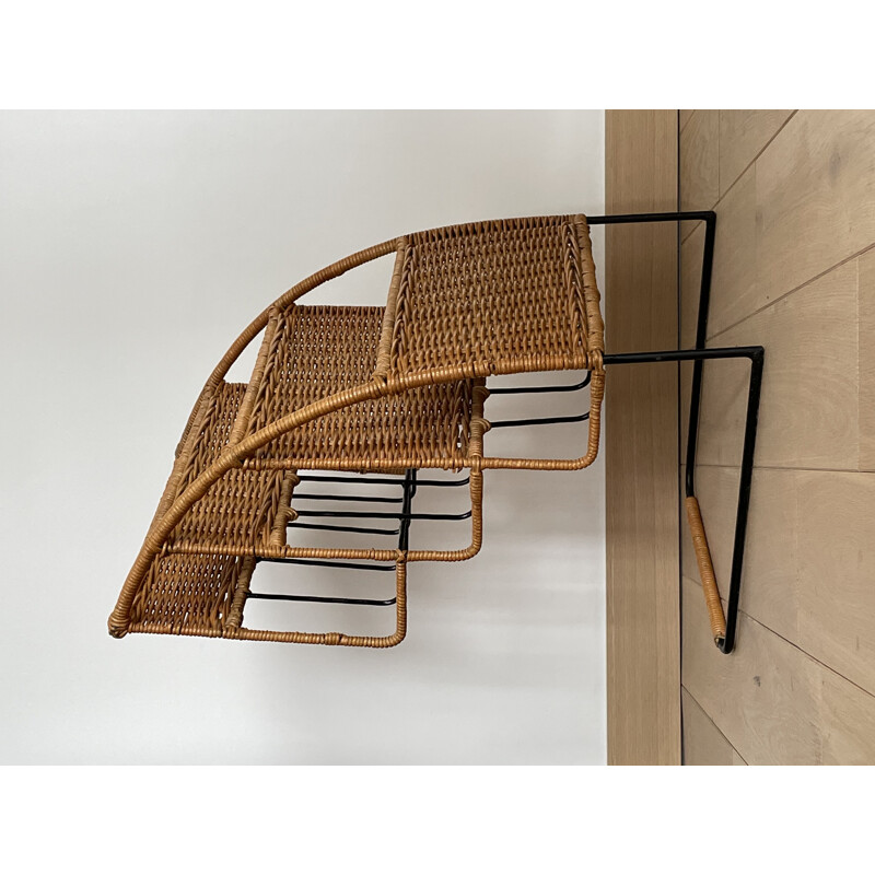 Vintage magazine rack in black lacquered metal and rattan by Raoul Guys, France 1950s