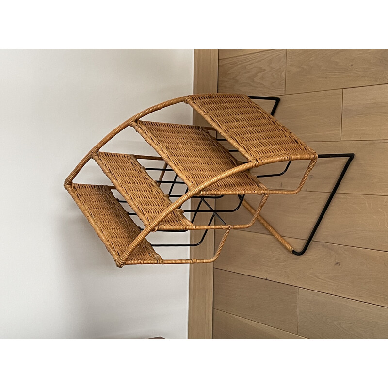 Vintage magazine rack in black lacquered metal and rattan by Raoul Guys, France 1950s