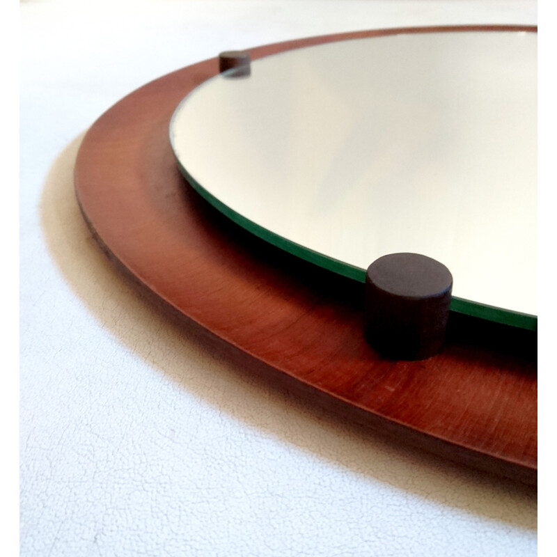 Italian round mirror in teak and rosewood - 1960s