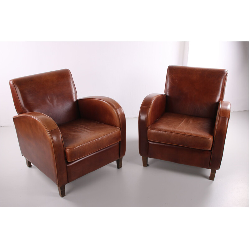 Pair de fauteuils Club Vintage en cuir de mouton 1970 modèle roue de chariot 1970