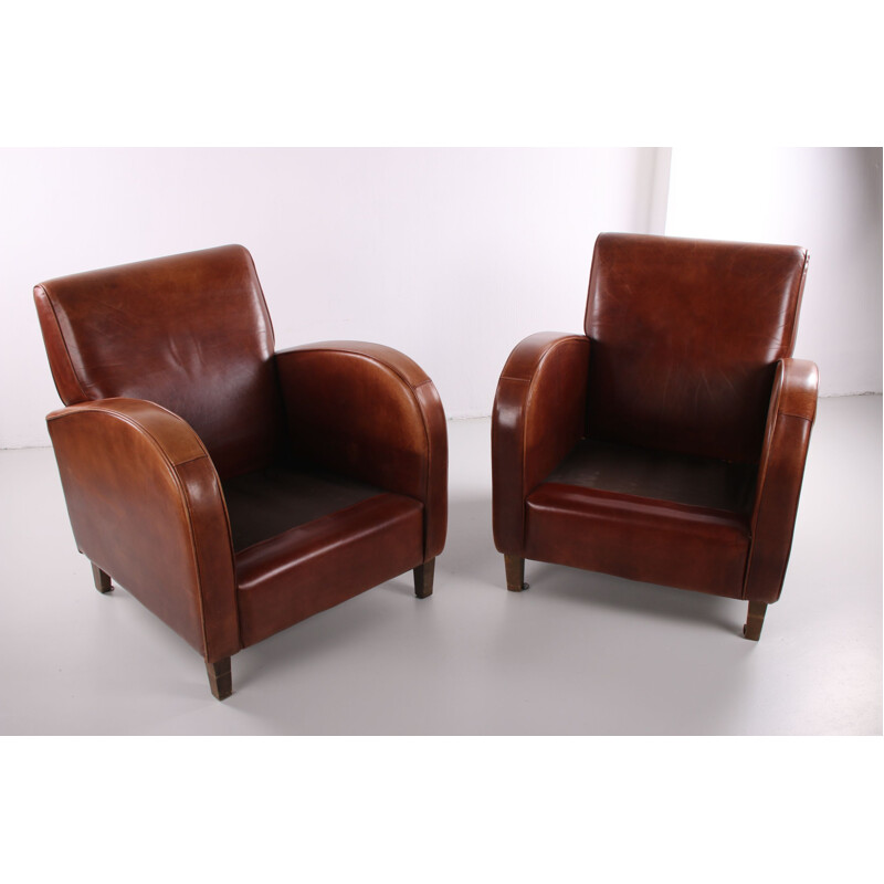 Pair de fauteuils Club Vintage en cuir de mouton 1970 modèle roue de chariot 1970