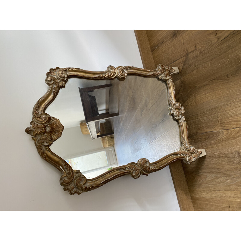 Vintage mirror in gilded wood