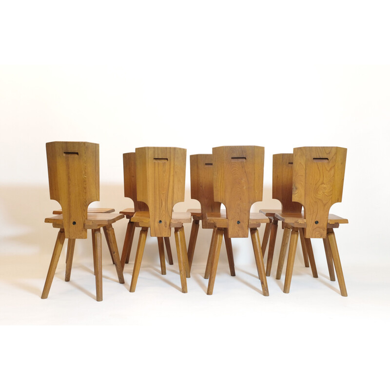 Set of 8 vintage chairs by Pierre Chapo