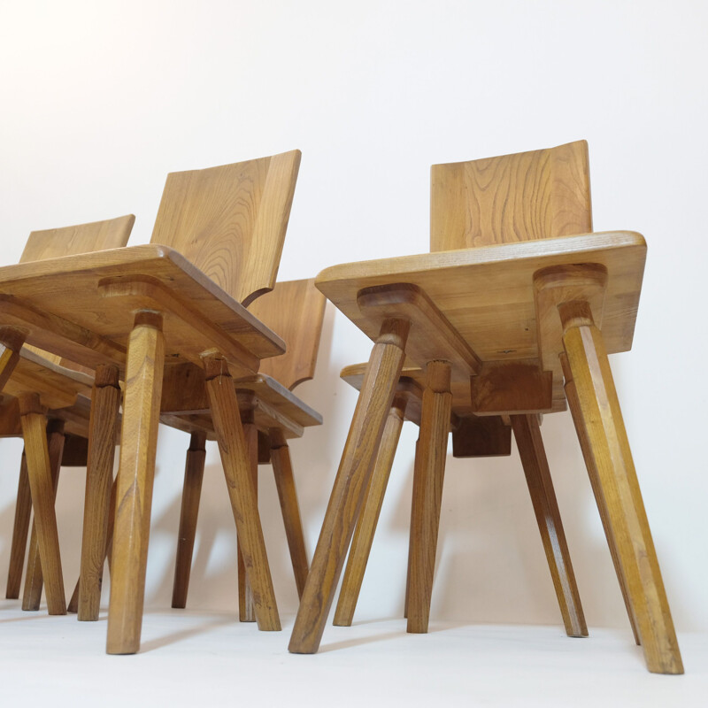 Set of 8 vintage chairs by Pierre Chapo