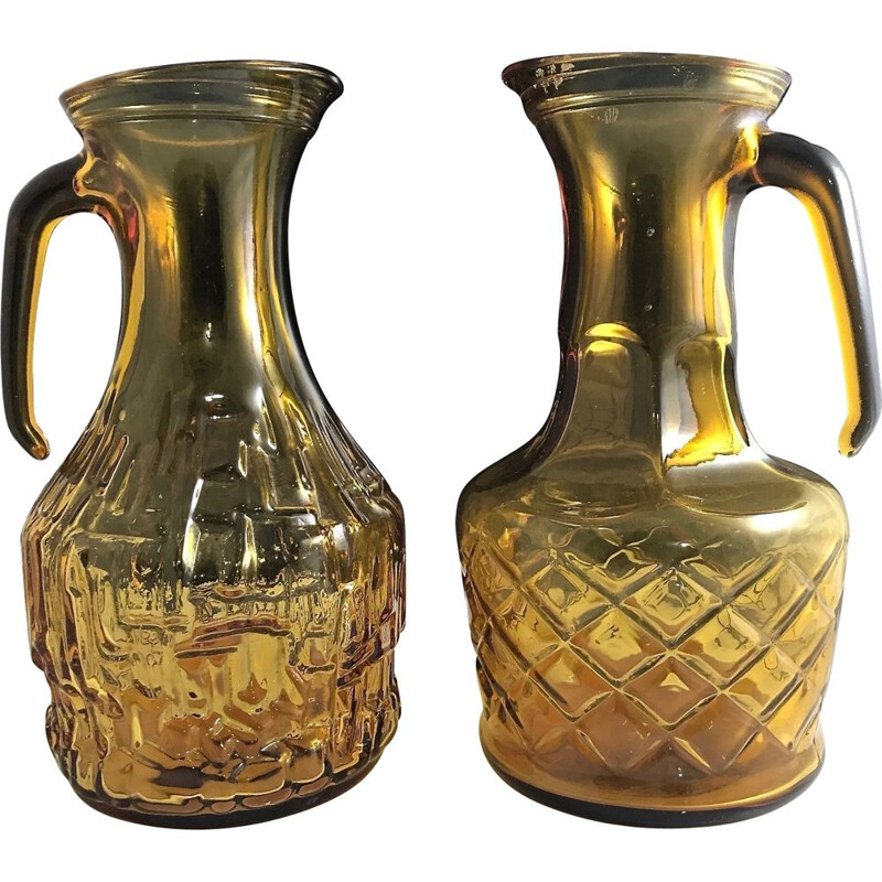 Pair of vintage glass decanters with honey, Italy