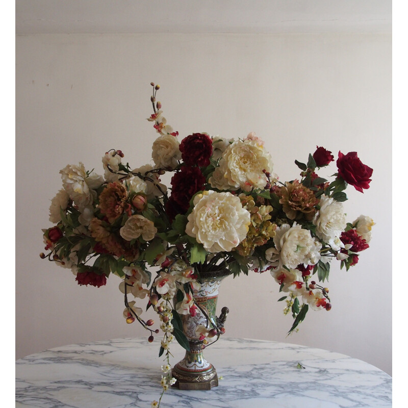 Vintage medicis vase with decorative bouquet