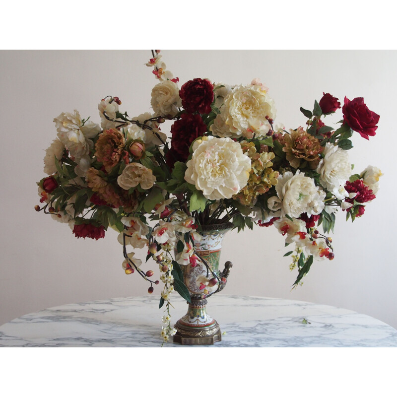 Vintage medicis vase with decorative bouquet