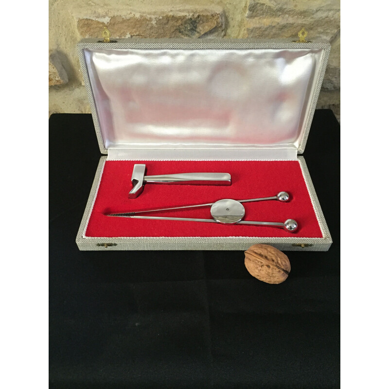 Vintage sugar tongs and bottle opener set by J.Adnet