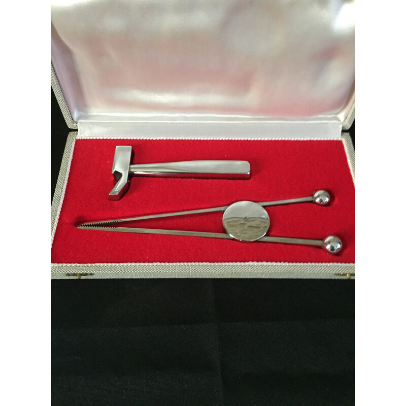 Vintage sugar tongs and bottle opener set by J.Adnet