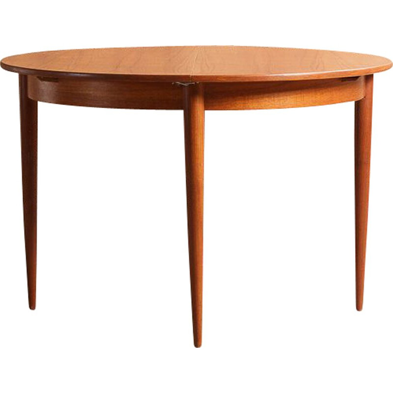 Vintage round teak table with black central extensions