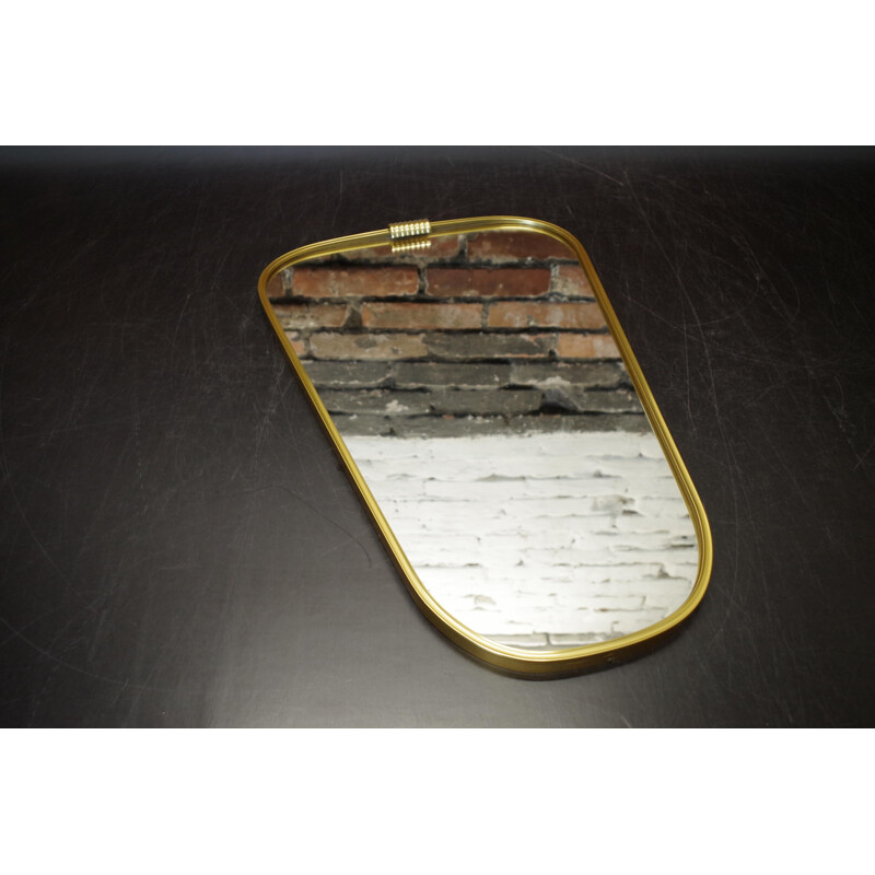 Miroir vintage asymétrique rockabilly dans un cadre en métal doré