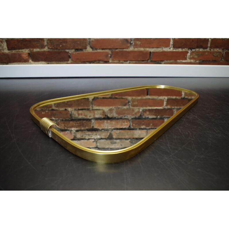 Miroir vintage asymétrique rockabilly dans un cadre en métal doré