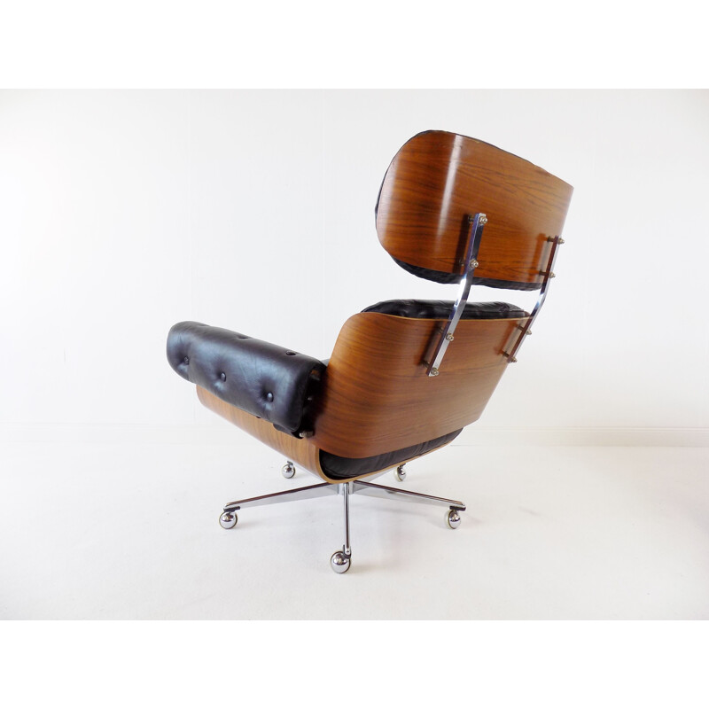 Fauteuil vintage en cuir Martin Stoll avec pouf 1960