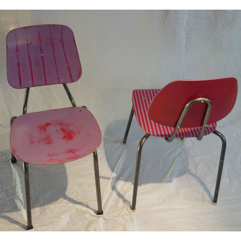 Paar vintage industriële stoelen