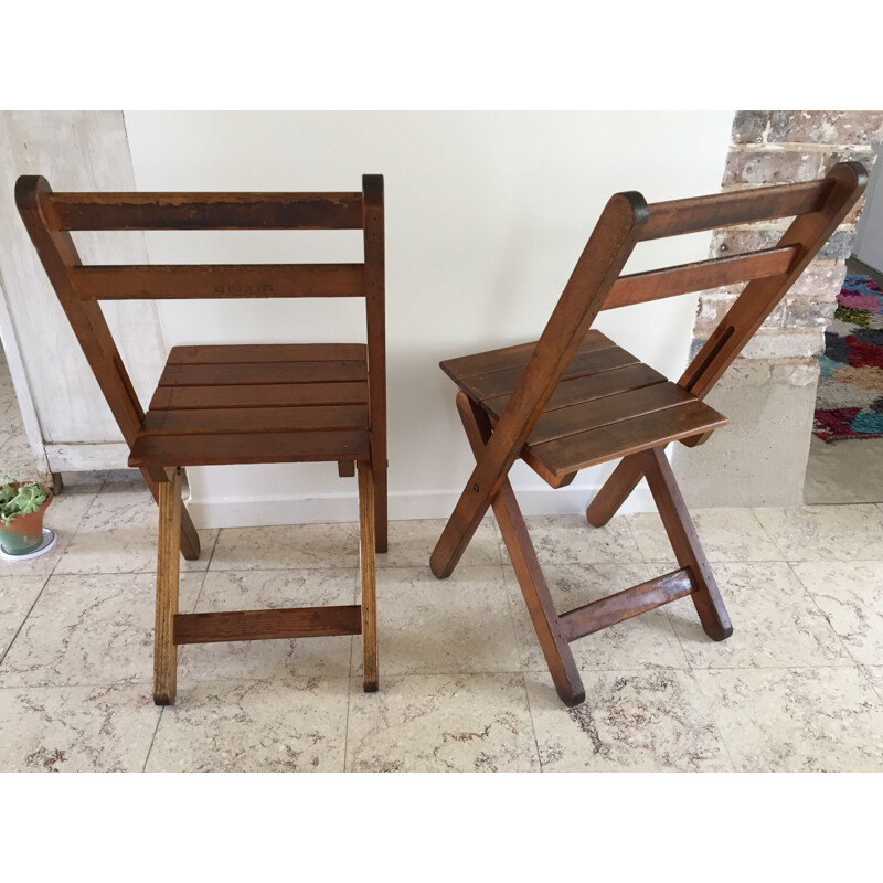 Paire de chaises vintage Pliantes estampillées au feu de bois