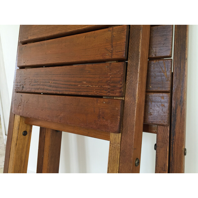 Pair of vintage woodstamped folding chairs