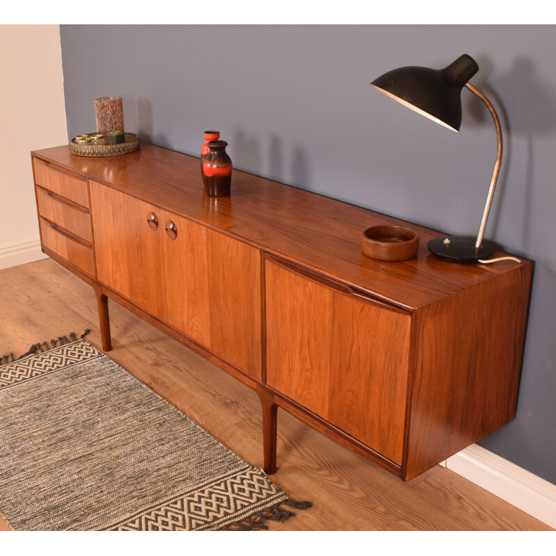 Long vintage Sideboard Rosewood Mcintosh Torpedo in the mid-twentieth century