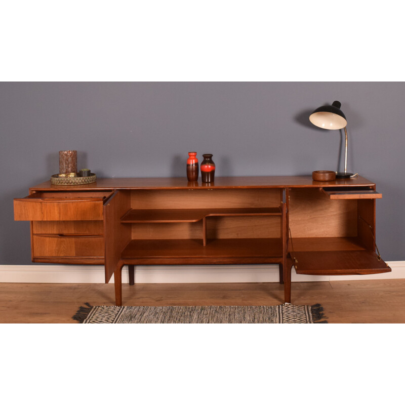 Long vintage Sideboard Rosewood Mcintosh Torpedo in the mid-twentieth century