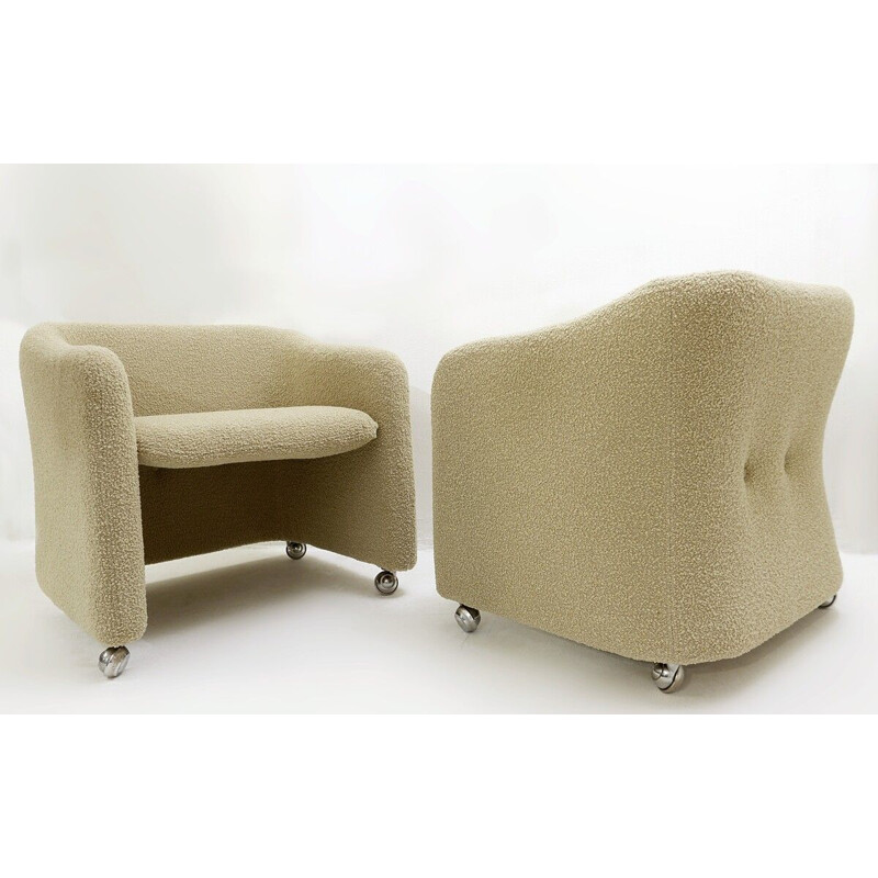 Pair of vintage armchairs on casters