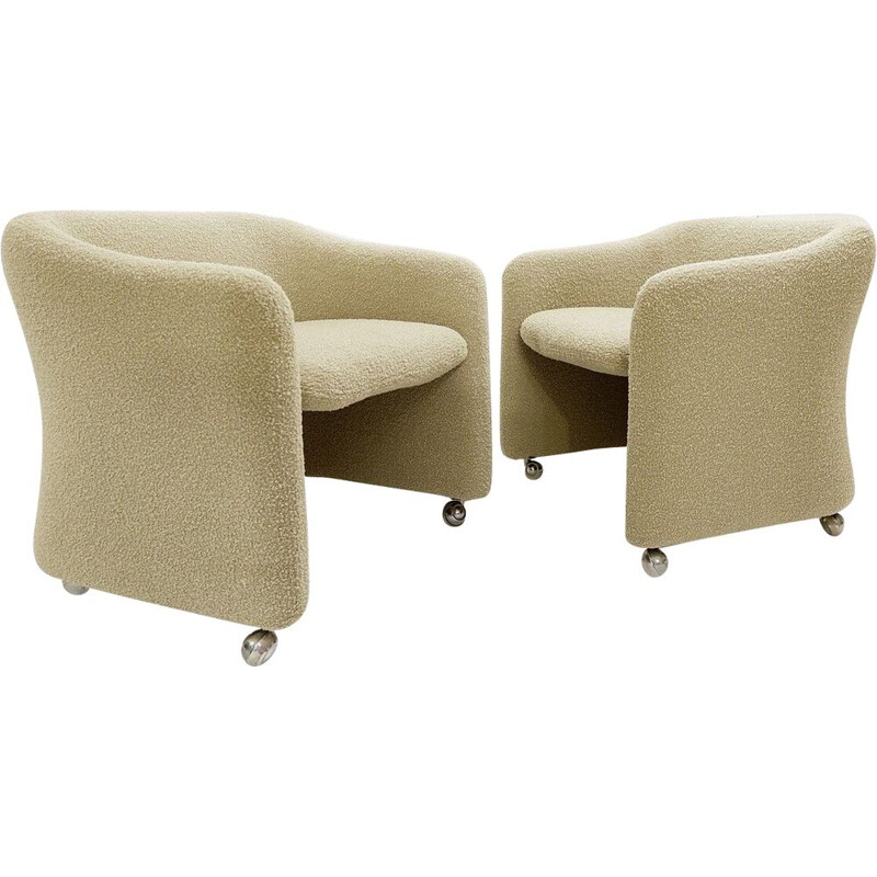 Pair of vintage armchairs on casters