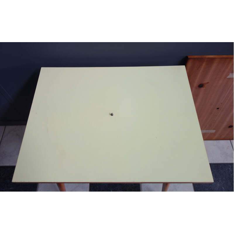 Vintage yellow formica side table with turntable, Czechoslovakia 1960