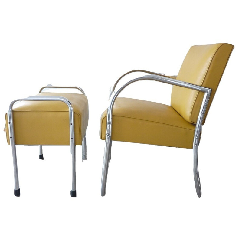 Vintage armchairn and its ottoman in chrome and leatherette - 1970s