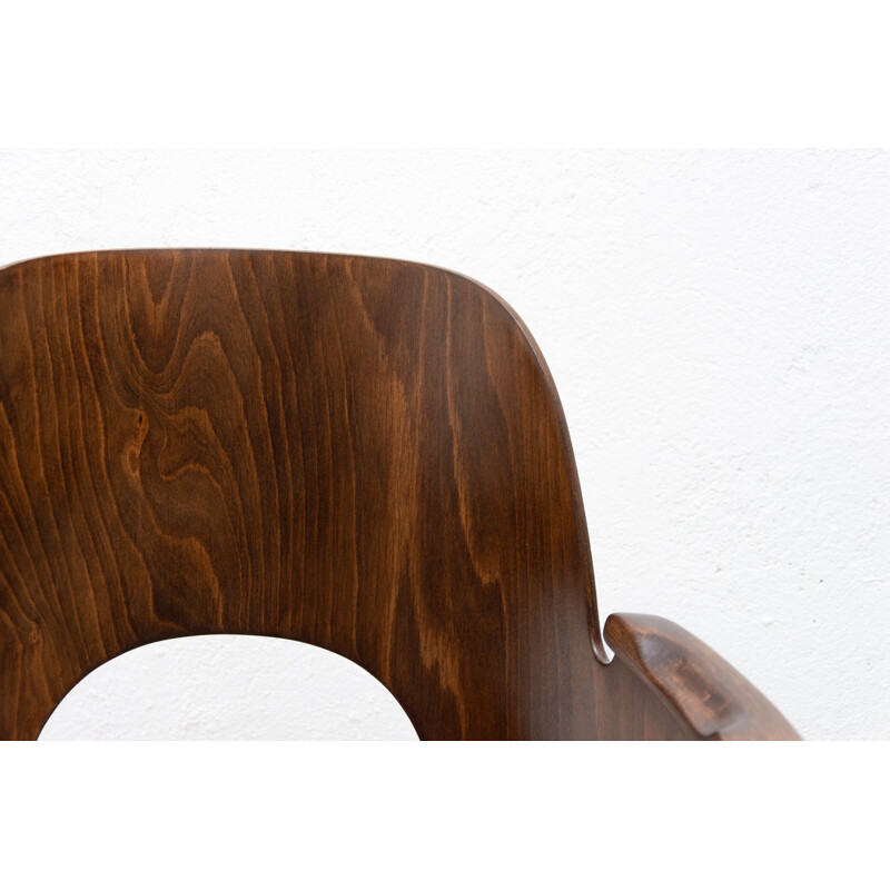 Vintage ebony desk chair by Radomír Hofman for Ton, Czechoslovakia 1960