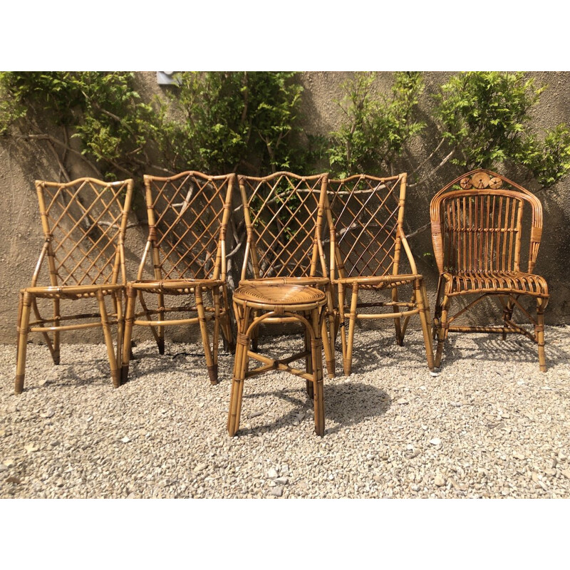 Set of 6 vintage rattan chairs and armchair by Louis Sognot 1960s