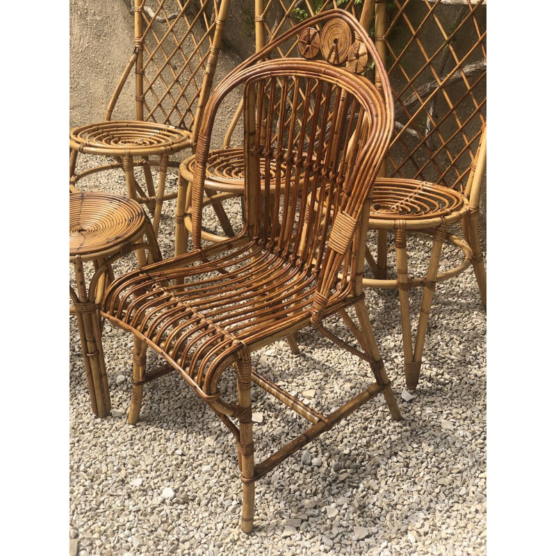 Lot de 6 chaises et fauteuil vintage en rotin de Louis Sognot 1960