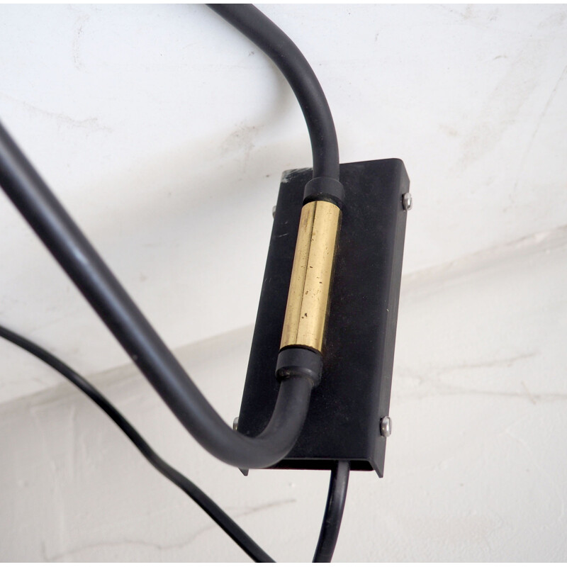 Vintage brass and black metal wall lamp by René Mathieu for Lunel, France 1950
