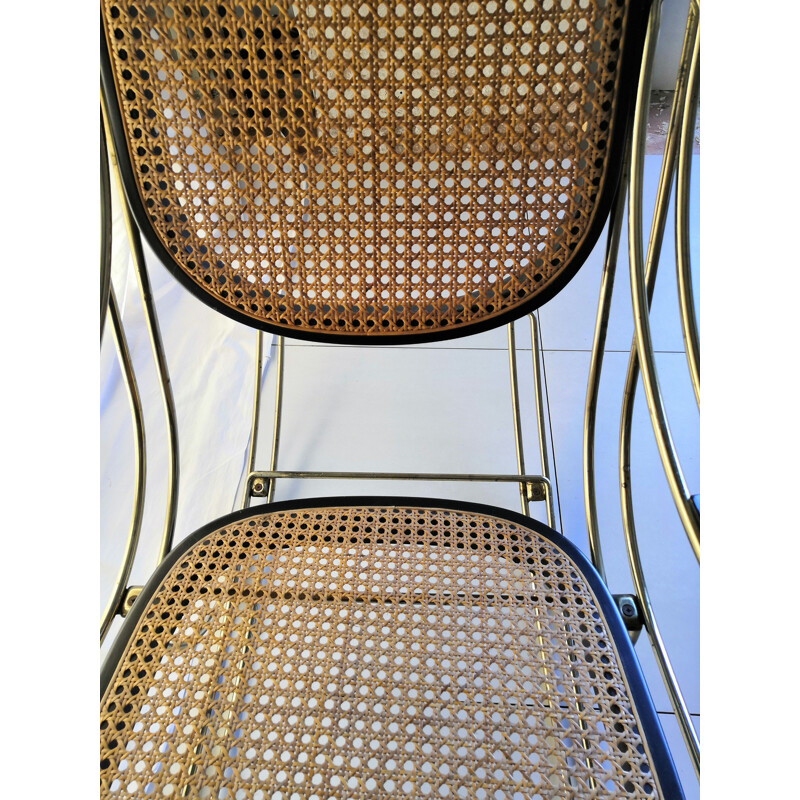 Vintage Thonet rocking chair in brass and cane