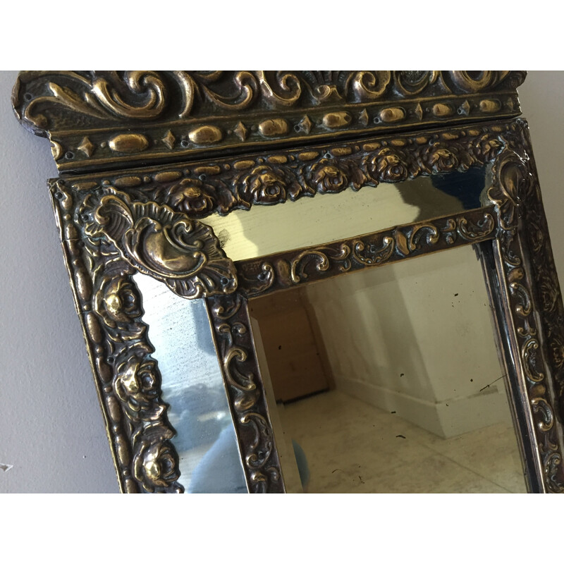 Vintage mirror with brass glazing