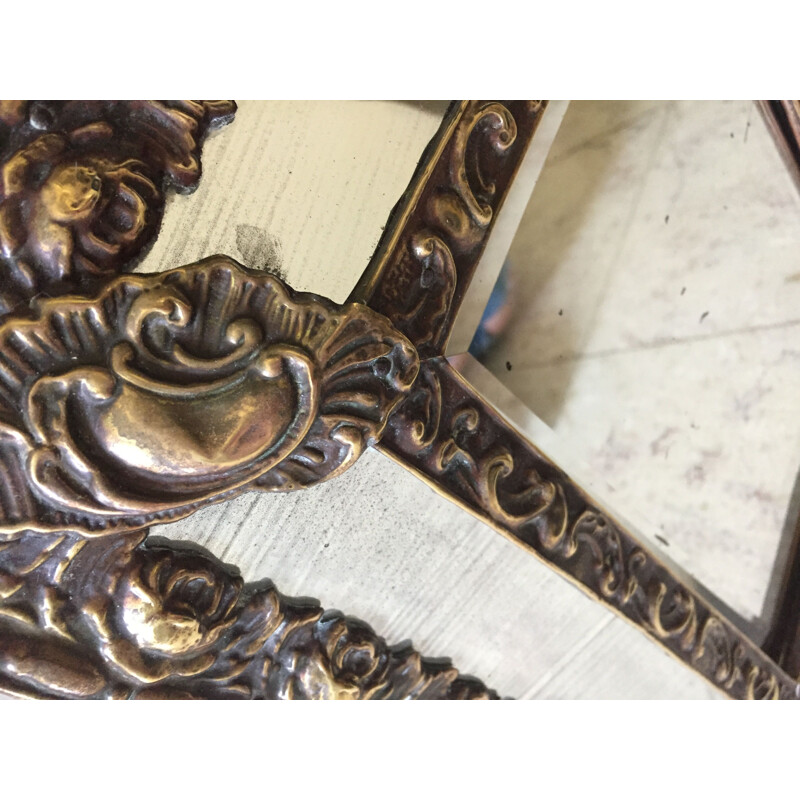 Vintage mirror with brass glazing