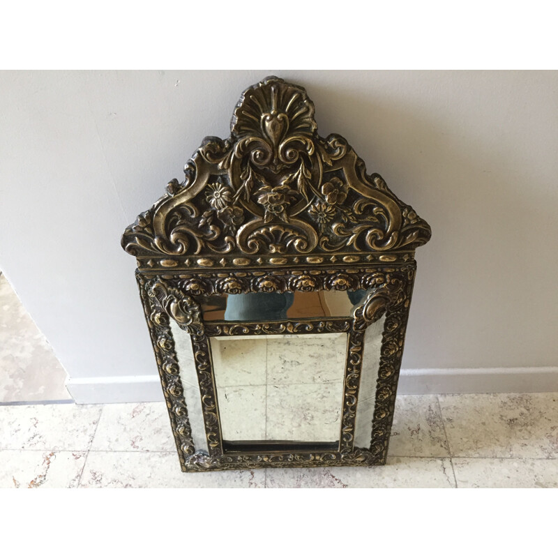 Vintage mirror with brass glazing