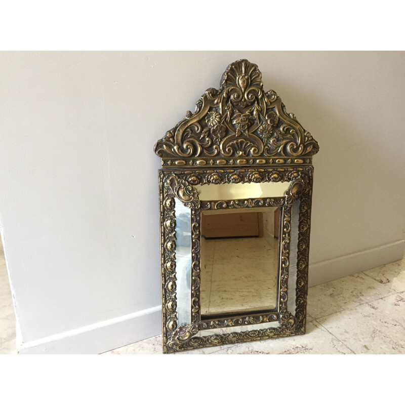 Vintage mirror with brass glazing