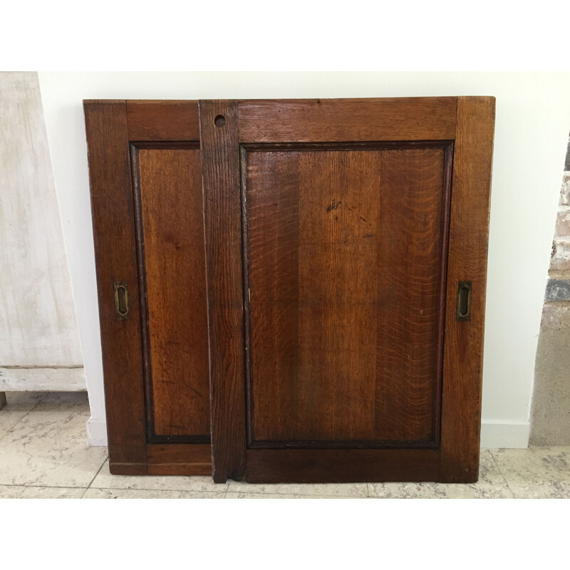 Pair of vintage sliding oak doors 