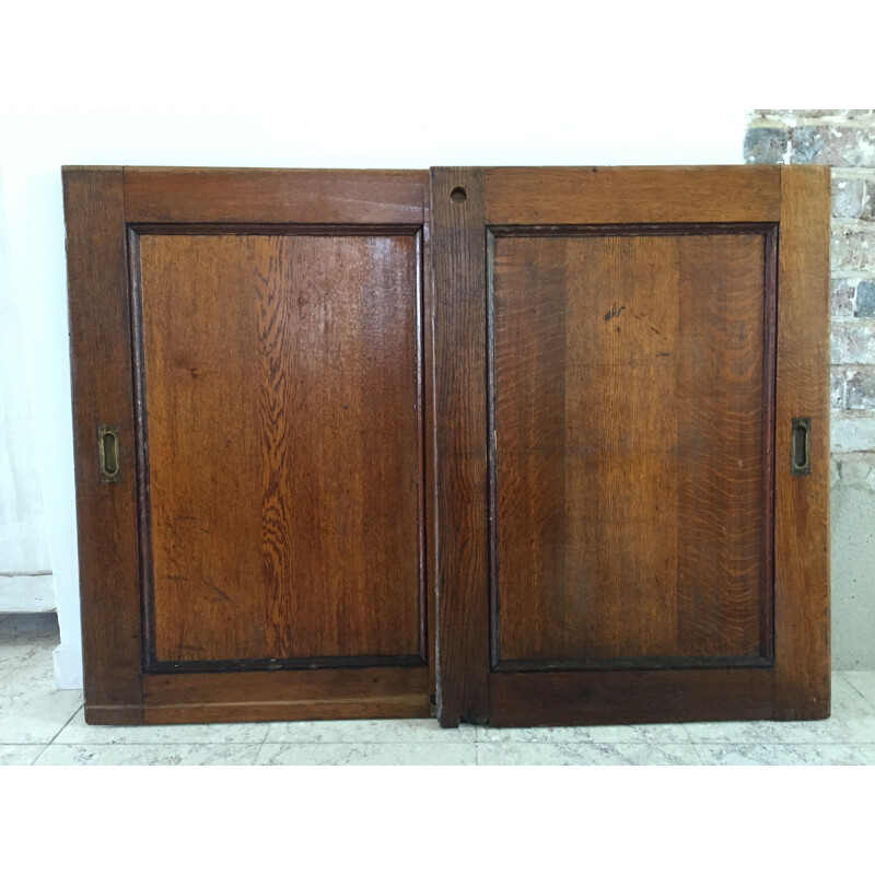 Pair of vintage sliding oak doors 