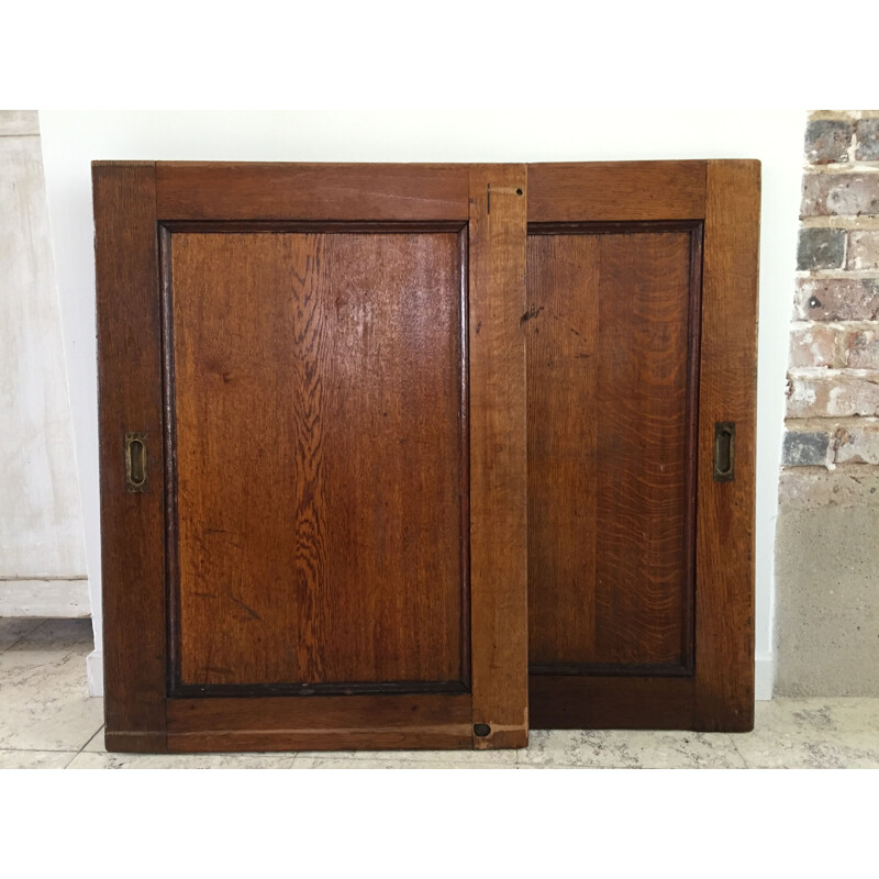 Pair of vintage sliding oak doors 