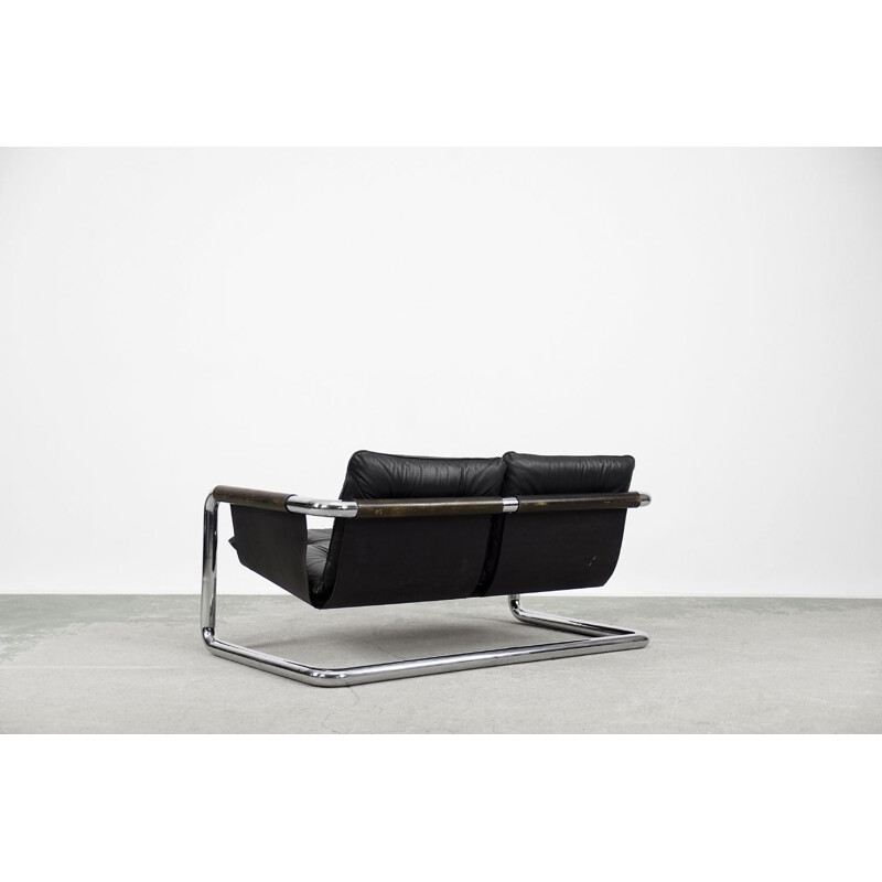 Sofá minimalista Bauhaus Brutalista vintage en metal tubular y cuero 1950