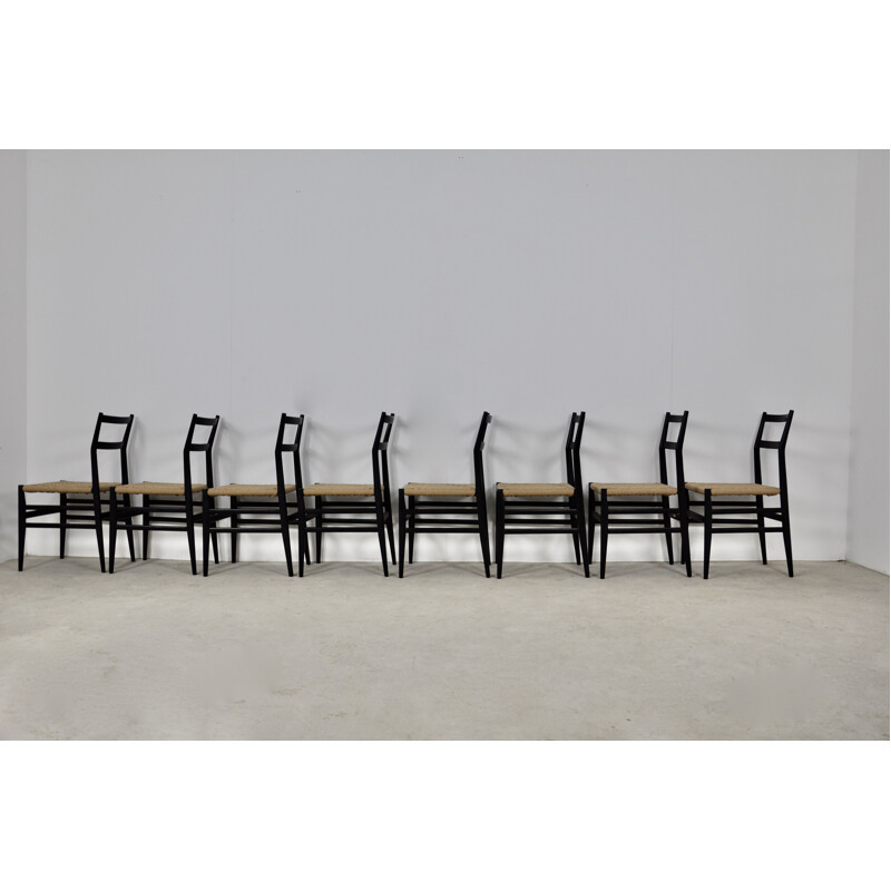 Set of 8 vintage Milano Leggera Chairs by Gio Ponti for Cassina 1960s